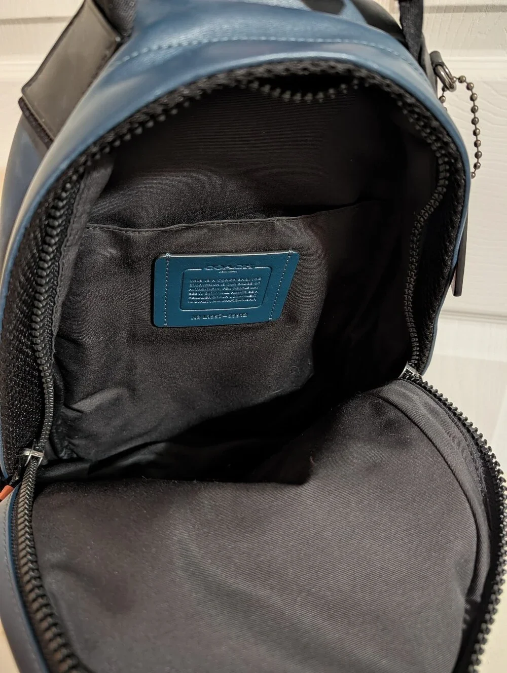 like new Coach mini backpack sling bag